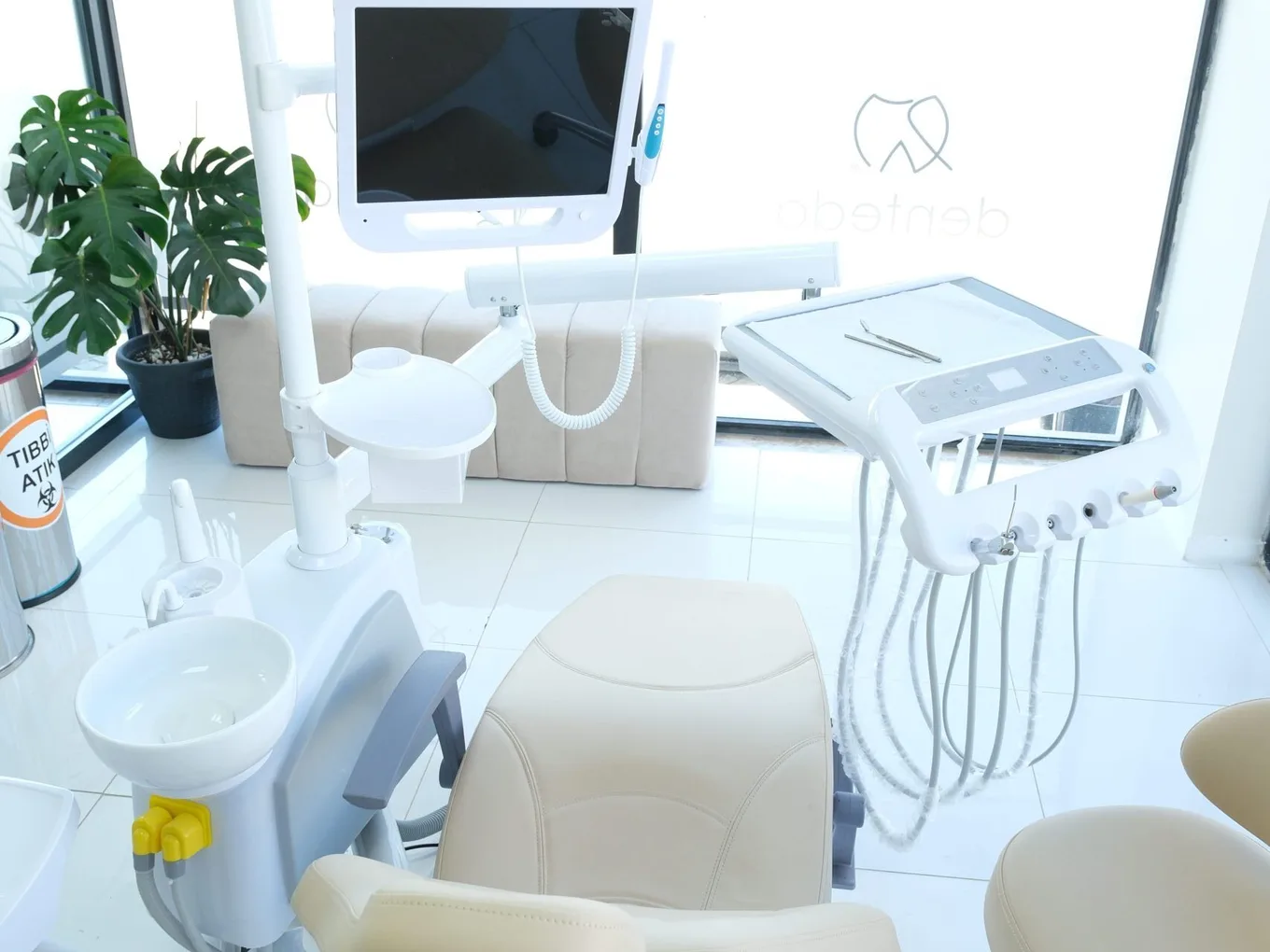 Dental chair and clinical equipment in a Denteda treatment room
