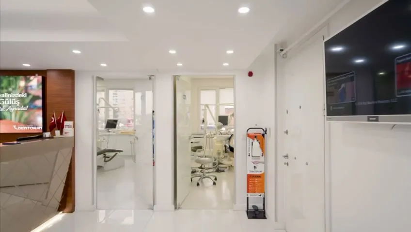 Bright clinic corridor and treatment rooms
