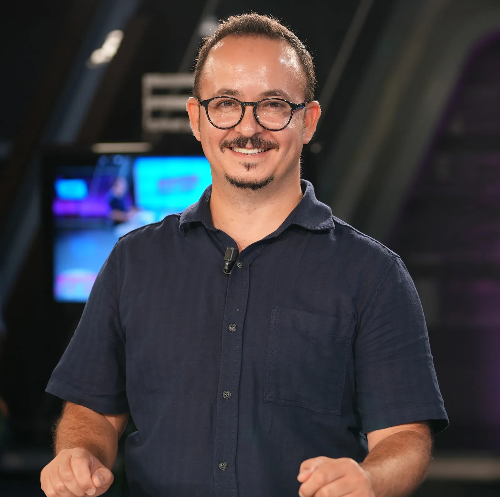 Official portrait of Dr Malik Abacı