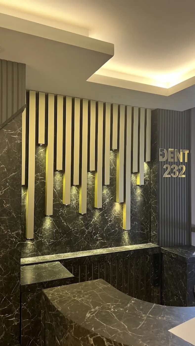 Reception detail with Dent 232 branding at the Forum branch