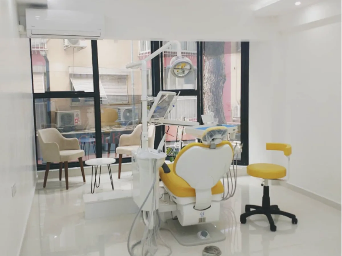 Bright Dent 232 treatment room with a yellow dental unit