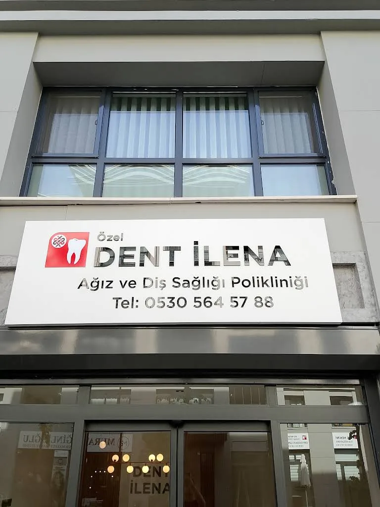 Close-up view of the Özel Dent İlena entrance sign