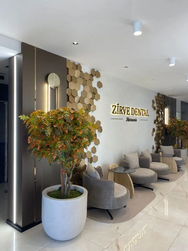 Waiting area with the Zirve Dental Marmaris wall logo
