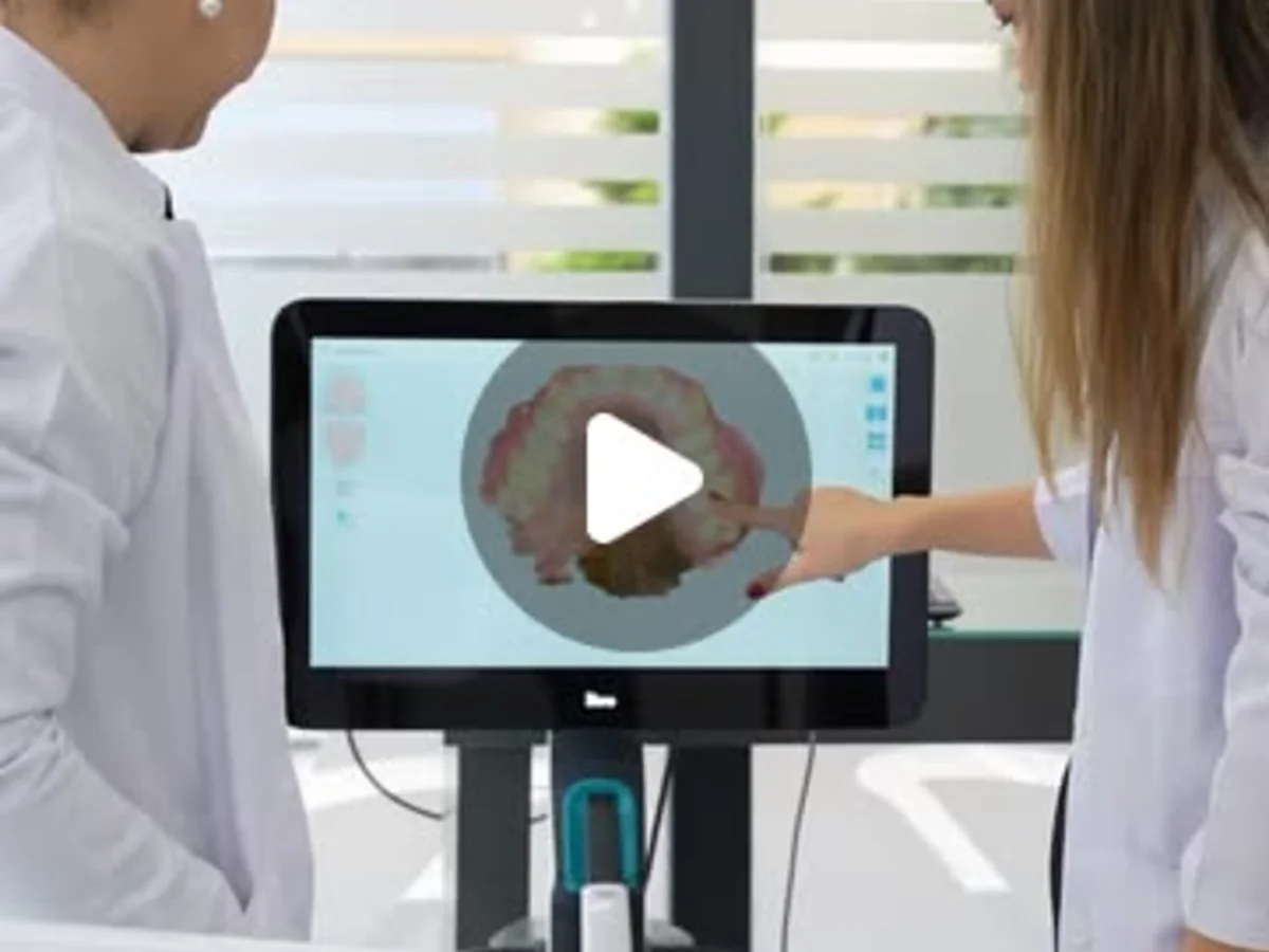 Pure Dental clinical team at an intraoral scanner display