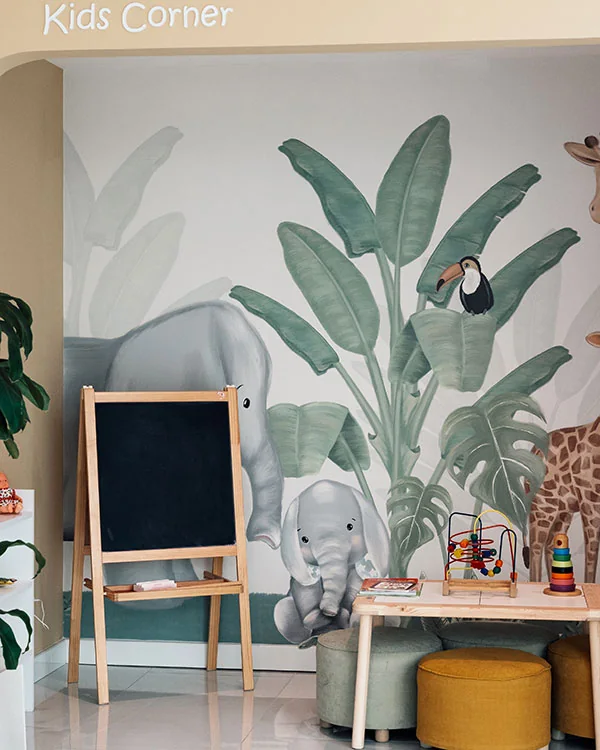 Zona de espera y rincón de juegos infantil de DENTAFE