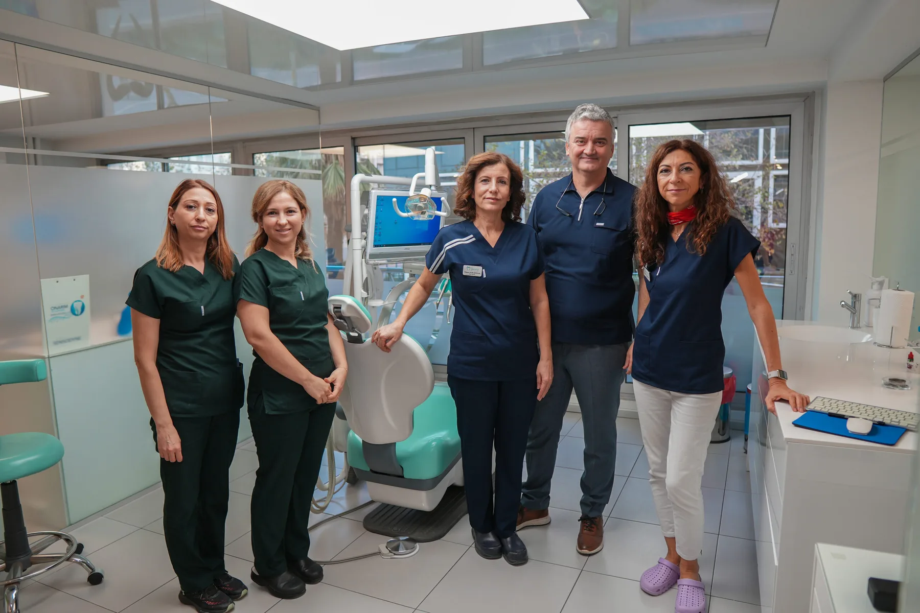 Dentiz dentists and clinical team in a treatment room