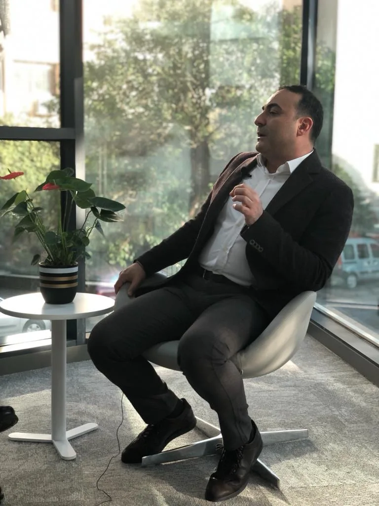 Assoc. Prof. İsmail Safa Satoğlu in a consultation area at the practice